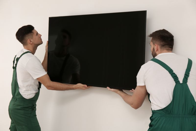Professional TV Hanging Service — Cost of TV Hanging Service